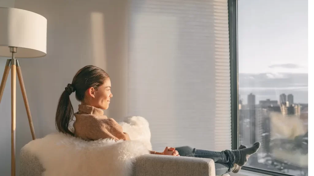 A woman looking out the window