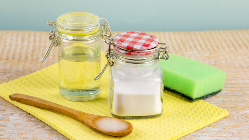 An image of water and baking soda ingredients to be used to clean your window