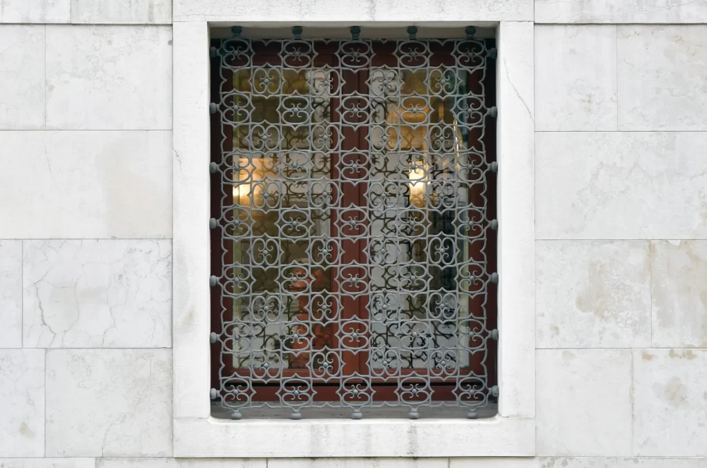 Window grille with geometric pattern